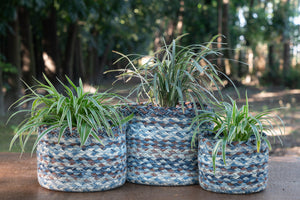 denim color braided jute plant basket with plants 